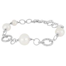 BRACCIALE PERLE DI FIUME E TONDI IN ARGENTO 925°/°°